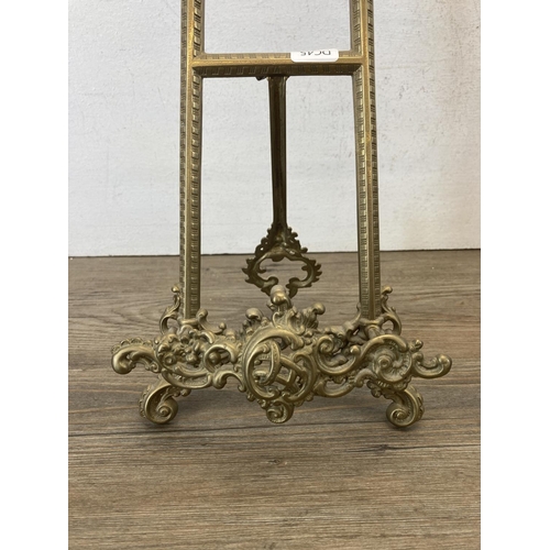 418 - A Rococo style gilt metal easel - approx. 40cm high