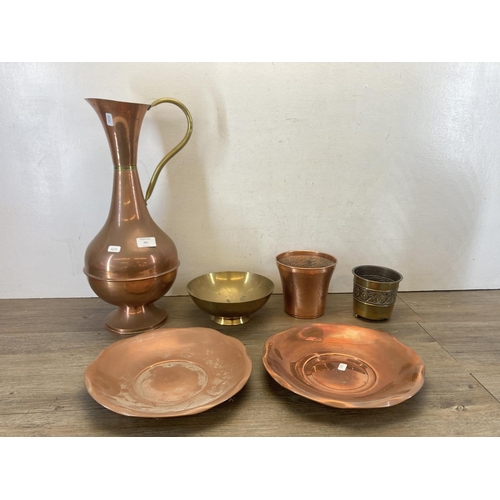 421 - Six pieces of copper and bronze ware to include 48cm pitcher, two Art Deco style bowls etc.