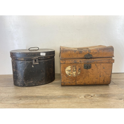 423 - Two late 19th/early 20th century metal storage boxes, one hat box and one dome top