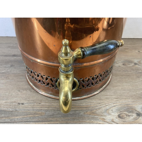 424 - A Victorian copper and pierced brass tea urn - approx. 50cm high x 29cm diameter