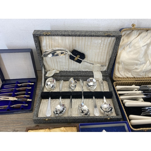 426 - A collection of boxed cutlery including GH thirteen piece silver plated fork and spoon set, RBS S1 p... 