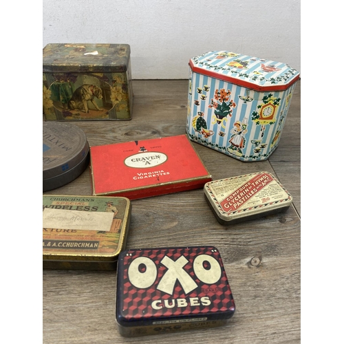 429 - A collection of vintage advertising tins