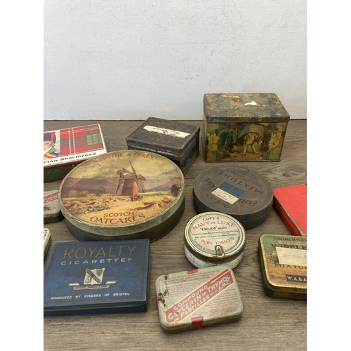 429 - A collection of vintage advertising tins