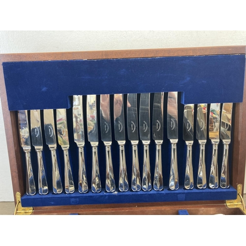 434 - A cased Housley International House of Fraser exclusive stainless steel cutlery set