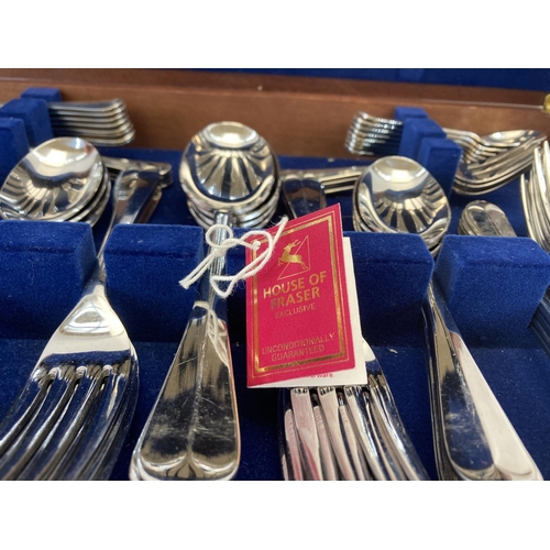 434 - A cased Housley International House of Fraser exclusive stainless steel cutlery set