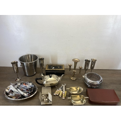 436 - A collection of metalware to include J.B.C & SD silver plated eperne, three piece silver plated tea ... 