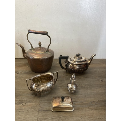 450 - A large collection of metalware to include Victorian copper and brass kettle, Art Deco JT & CO. thre... 