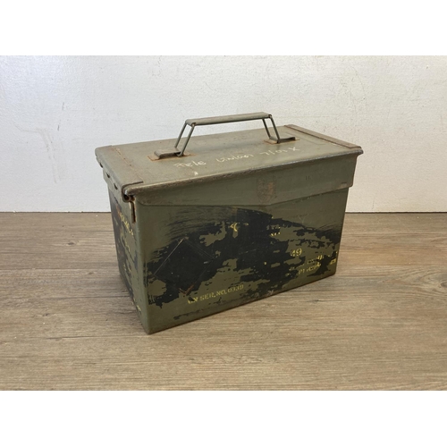 453 - Three pieces of metalware, two military issued ammunition boxes and one 20ltr water can