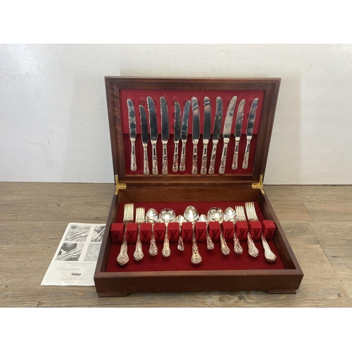 456 - A cased stainless steel cutlery set with Viners instruction manual