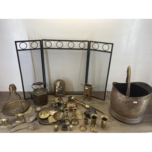 459 - A collection of 19th century and later metalware to include brass coal scuttle, Middle Eastern style... 