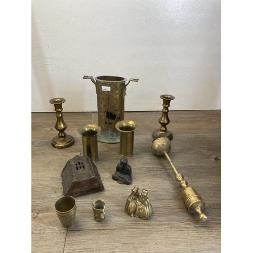 459 - A collection of 19th century and later metalware to include brass coal scuttle, Middle Eastern style... 