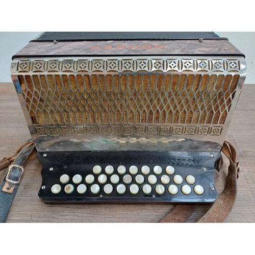 785 - A cased vintage Hohner Club III diatonic three-row button melodeon with music books