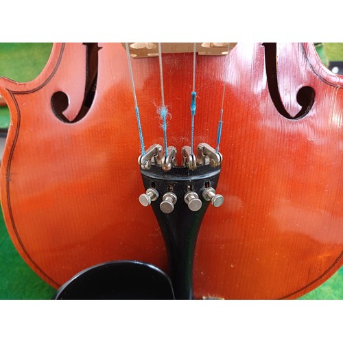 793 - A cased Hsinghai full size violin with bow, shoulder rest and rosin