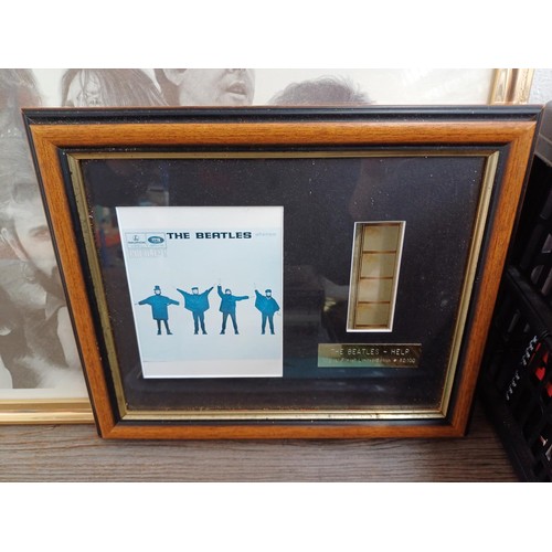 737 - A collection of The Beatles memorabilia and media to include framed print, Abbey Road LP, books, DVD... 