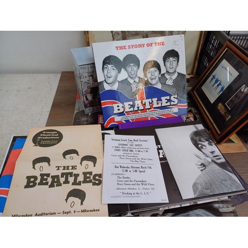 737 - A collection of The Beatles memorabilia and media to include framed print, Abbey Road LP, books, DVD... 