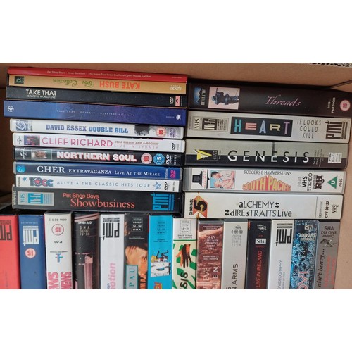 748 - A collection of music VHS videos and DVDs to include Cream, The Who, Michael Jackson, Pet Shop Boys,... 