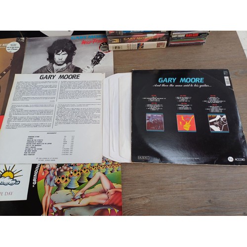 754 - A large collection of Gary Moore CDs, DVDs, VHS videos and LP vinyl records to include 'Dirty Finger... 