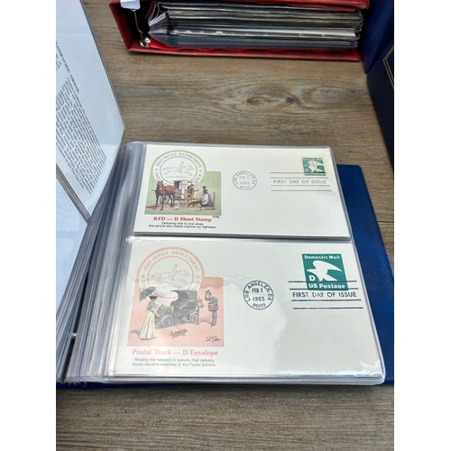 594 - Nine first day cover albums containing first day covers