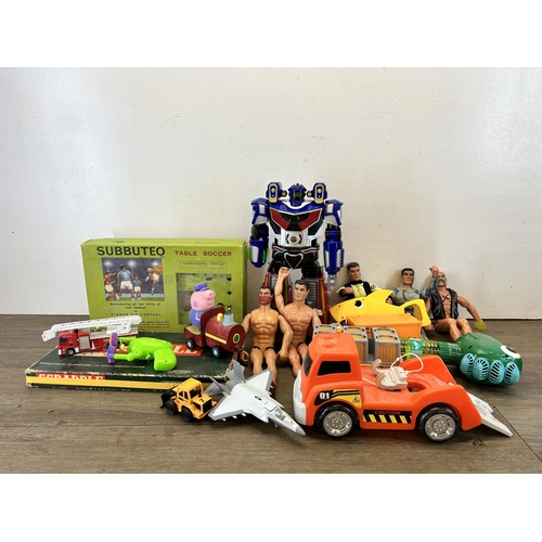 483 - A collection of toys and games to include vintage Subbuteo table football set, Action Man figurines,... 