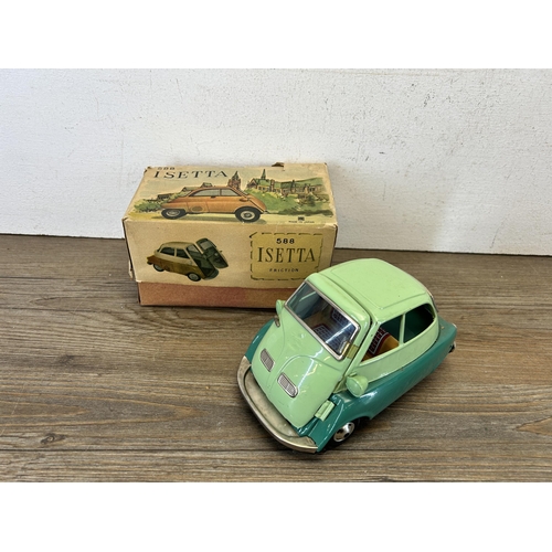 485 - A vintage boxed Isetta 588 friction tin plate model vehicle