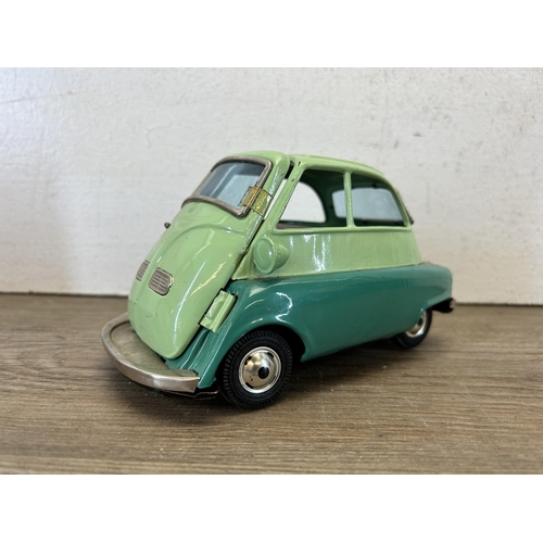 485 - A vintage boxed Isetta 588 friction tin plate model vehicle