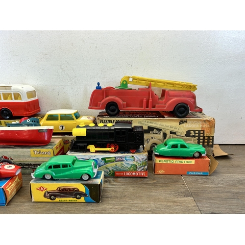 488 - Nine vintage boxed model vehicles to include Tri-ang clockwork tugboat, The Linder No. 28144 frictio... 