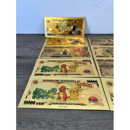 494 - Fourteen Pokémon Go Nippon Ginko 100 million yen 24ct gold foil novelty bank notes