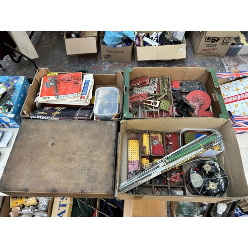 495 - Four boxes containing a large collection of vintage Meccano construction accessories