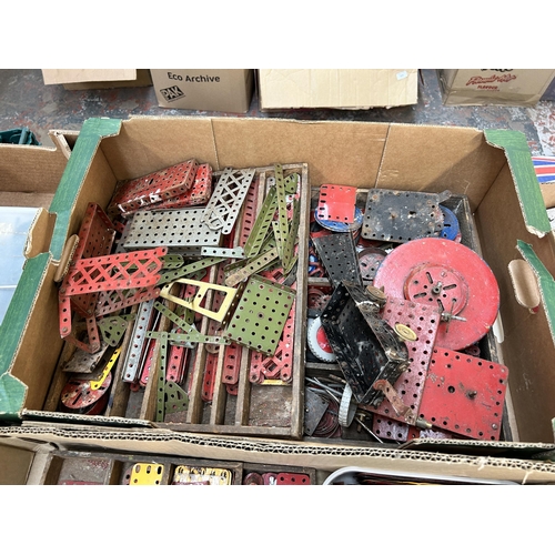 495 - Four boxes containing a large collection of vintage Meccano construction accessories