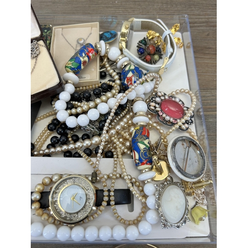 536 - A collection of costume jewellery and wristwatches to include 9ct gold plated bangle, sterling silve... 