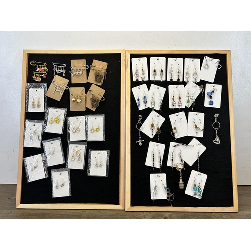 541 - A collection of ladies earrings and brooch sets