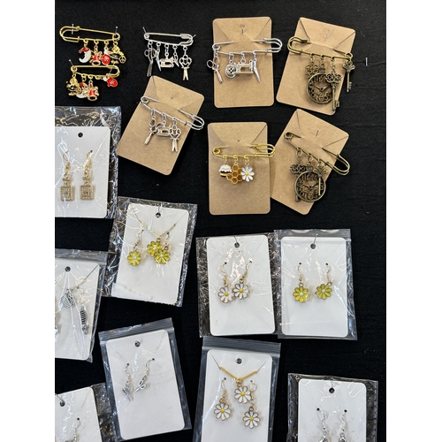 541 - A collection of ladies earrings and brooch sets