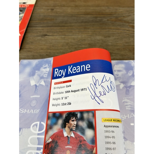 572 - A collection of 1990s Manchester United official programmes together with a signed official year boo... 