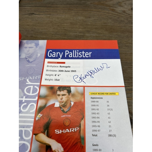 572 - A collection of 1990s Manchester United official programmes together with a signed official year boo... 