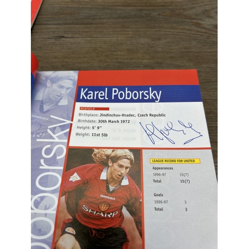 572 - A collection of 1990s Manchester United official programmes together with a signed official year boo... 