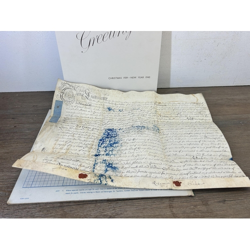 576 - A collection of Georgian and later ephemera to include hand written indenture dated 1722, black and ... 