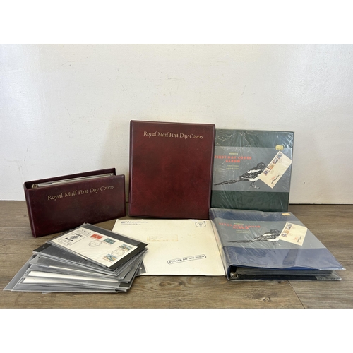 581 - Three Royal Mail first day cover albums containing a large collection of first day covers