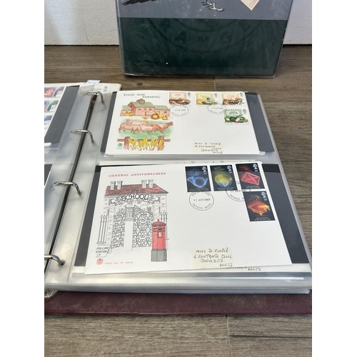 581 - Three Royal Mail first day cover albums containing a large collection of first day covers