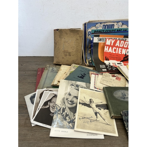 586 - A collection of antique and later items to include autograph album, RAC car badge, early 20th centur... 