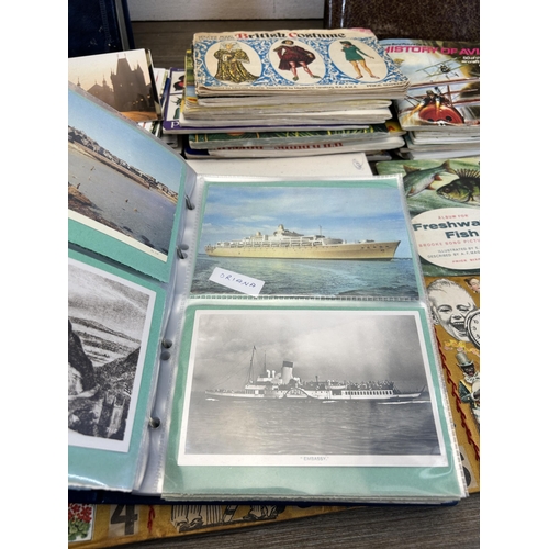 587 - A large collection of vintage postcards and picture cards together with four Victorian portrait phot... 