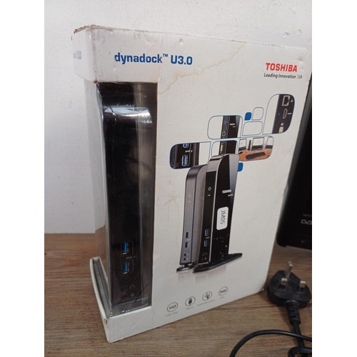 733 - Two items, one boxed Toshiba Dynadoc U3.0 USB dock and one Tevion 1943DT 19