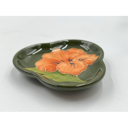 296 - A Moorcroft Coral Hibiscus pattern clover shaped trinket dish - approx. 7cm x 7cm