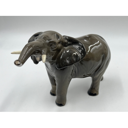 329A - Two ceramic figurines, one Beswick elephant and one Yoshimi K dragon - largest approx. 15cm high