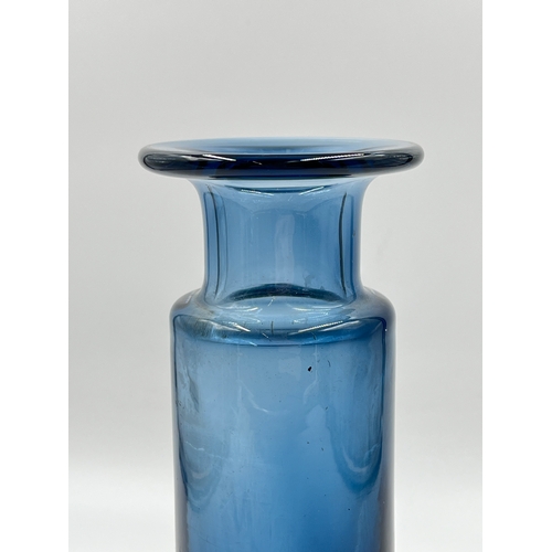 335 - A mid 20th century blue glass vase, signed to base - approx. 22cm high