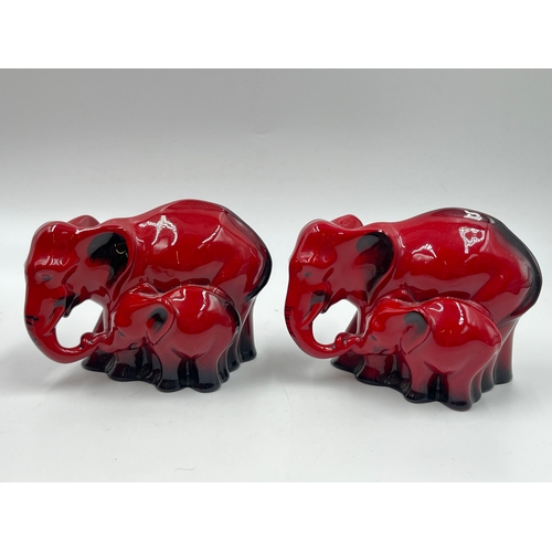 337 - Two boxed Royal Doulton Flambé Elephant and Young figurines - HN 3548