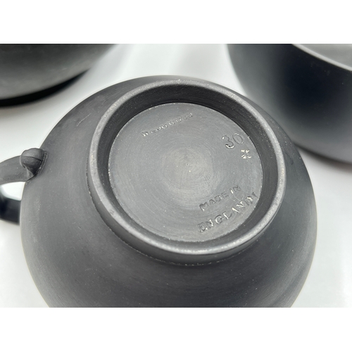 338 - A Wedgwood black basalt three piece tea set