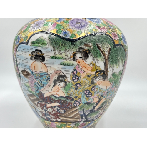 347A - A Chinese hand painted porcelain vase - approx. 23cm high