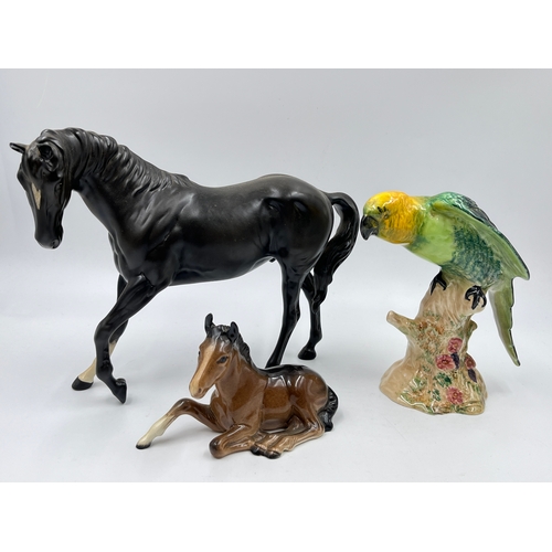 349J - Three Beswick figurines, no. 930 Parakeet, no. 915 Foal and no. 2466 Black Beauty