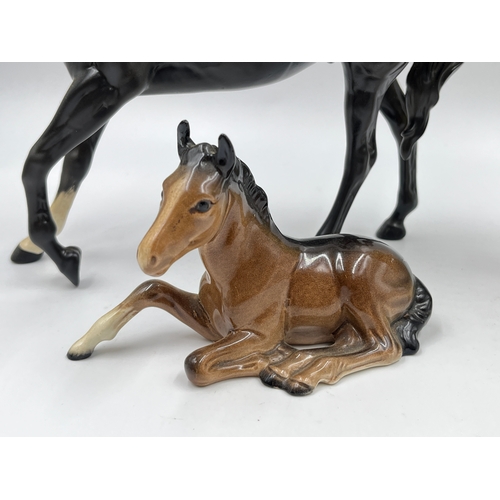 349J - Three Beswick figurines, no. 930 Parakeet, no. 915 Foal and no. 2466 Black Beauty