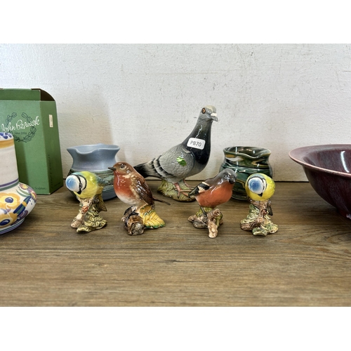 382 - Nine pieces of ceramics to include Carter Stabler Adams Ltd Poole England vase, five Beswick bird fi... 